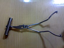 Axis traction device for delivery forceps.jpg