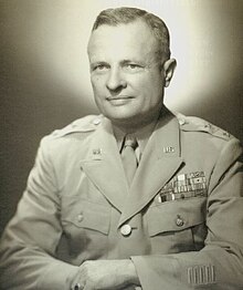 Black and white 1946 head and shoulders photo of Major Donald A. Stroh in dress uniform, seated at desk