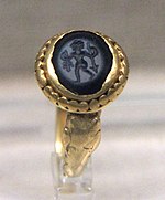 Gem-inlaid gold ring of Central Asian design, tomb of Xu Xianxiu, 571 AD.[153][154]