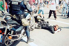 Protestors attempting to block police on motorcycles April 16th, 2000, Washington DC, 17th & E Sts.