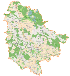 Mapa konturowa powiatu trzebnickiego, na dole po prawej znajduje się punkt z opisem „Pałac w Rzędziszowicach”