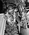 Flight engineer of a Lancaster checks his gauges