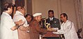 Fr. Cedric Prakash receiving the 'Kabir Puraskar' from President Shankar Dayal Sharma in November 1995.