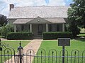 This 19th-century pioneer house, was constructed by physician and Confederate veteran J.C. Cornelius. The restored home now serves as a museum.