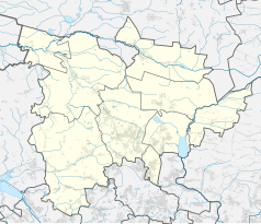 Mapa konturowa powiatu tarnogórskiego, po prawej znajduje się punkt z opisem „Ożarowice”