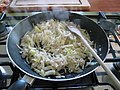 Onions cooked in a frying pan