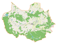 Mapa konturowa gminy Jonkowo, blisko centrum u góry znajduje się punkt z opisem „Pupki”