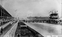 Cars line up on the track at the Indianapolis Motor Speedway, 1911