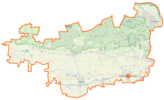 Mapa konturowa powiatu warszawskiego zachodniego, blisko prawej krawędzi u góry znajduje się punkt z opisem „MarcPol Spółka Akcyjna w upadłości”