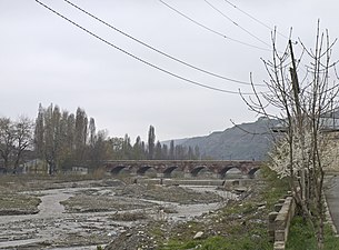 The arch bridge over the Qudyal river connecting Quba (left) and Qırmızı Qəsəbə (right)