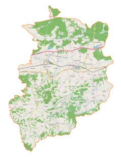 Mapa konturowa powiatu ropczycko-sędziszowskiego, blisko centrum na lewo u góry znajduje się punkt z opisem „Ostrów”