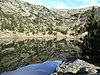 Vue du lac Achard dominée par la Croix de Chamrousse.