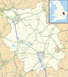 Mapa konturowa Cambridgeshire, na dole znajduje się punkt z opisem „Kolegium Trójcy Świętej w&nbsp;Cambridge”