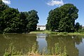 El castell d'Elderen, l'estany i el parc