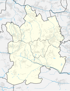 Mapa konturowa powiatu mikołowskiego, blisko centrum na lewo znajduje się punkt z opisem „Pałac w Orzeszu-Zawiści”