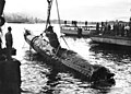 Image 35A Japanese Ko-hyoteki-class midget submarine, believed to be Midget No. 14, is raised from Sydney Harbour (from History of the Royal Australian Navy)