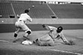 Image 5 Ty Cobb Photo: National Photo Company; restoration: Lise Broer; crop: jjron Ty Cobb (1886–1961), shown here sliding into third base on August 16, 1924, was an American Major League Baseball (MLB) outfielder. He spent twenty-two seasons with the Detroit Tigers, including six as the team's player-manager, and finished his career with the Philadelphia Athletics. During this time Cobb set ninety MLB records, though his abilities were sometimes overshadowed by his surly temperament and aggressive playing style. In 1936 Cobb was made an inaugural member of the Baseball Hall of Fame, and in 1999 editors at the Sporting News ranked him third on their list of "Baseball's 100 Greatest Players". More selected pictures