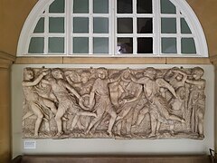 Inside the loggia of the Museum, with a cast of Donatello's Cantoria for Florence Cathedral