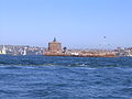 Fort Denison in Sydney Harbour with a residential background.