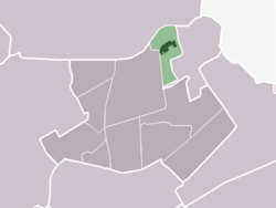The village centre (dark green) and the statistical district (light green) of Opperdoes in the municipality of Medemblik.