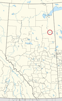 A map of the province of Alberta showing 80 counties and 145 small Indian reserves. One is highlighted with a red circle.