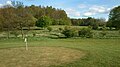 Golf course with hills in background