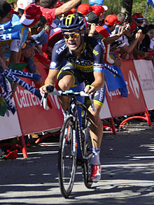 Photo d'un coureur cycliste sur son vélo.