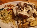 Image 71Pork chop with plantain chips. (from Honduran cuisine)