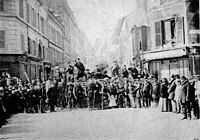 Barricade rue Saint-Sébastien au carrefour avec le boulevard Richard-Lenoir durant la Semaine Sanglante.