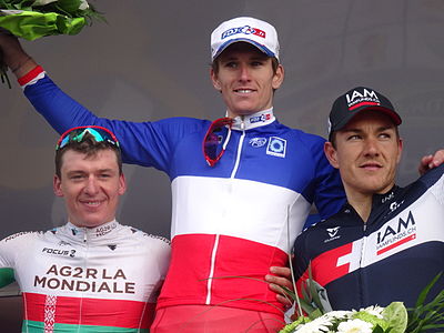 Podium de l'édition 2014 du Grand Prix d'Isbergues : Yauheni Hutarovich (2e), Arnaud Démare (1er) et Heinrich Haussler (3e).