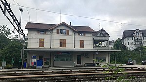 Three-story building with gabled roof