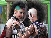 Two goths with backcombed deathhawks