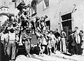 Brazilian soldiers of the Brazilian Expeditionary Force greet civilians in the city of Massarosa, Italy, September 1944.