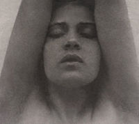 Tina Modotti with arms raised – Edward Weston, c. 1921