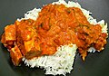 Image 64Chicken tikka masala, served atop rice. An Anglo-Indian meal, it is among the UK's most popular dishes. (from Culture of the United Kingdom)