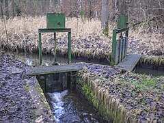 Wehranlage zur Teilung des Fischbaches