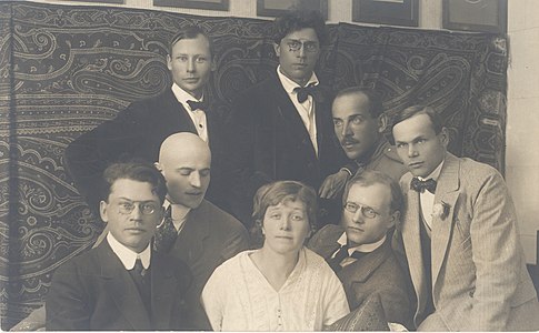 Members of the Estonian Siuru literary circle in 1917, rear: Peet Aren, Otto Krusten, and Johannes Semper. front row: Friedebert Tuglas, Artur Adson, Marie Under, August Gailit, and Henrik Visnapuu