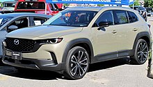 2023 Mazda CX-50 GT in Zircon Sand Metallic, Front Left, 06-18-2022.jpg