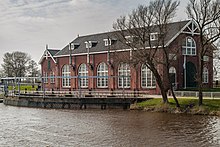 De Waterwolf vanaf de brug over de Kommerzijlsterrijte (2013)