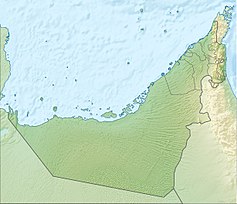 Mapa konturowa Zjednoczonych Emiratów Arabskich, blisko centrum na prawo znajduje się punkt z opisem „Yas”