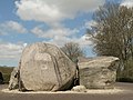 Glacial erratic. The label on the left stone shows the Dutch for "Stones from Norway".