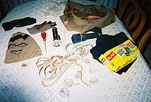 The murder kit includes a sports bag, garbage bags, ski mask, nylon stocking with holes, flashlight, crowbar, an ice pick, and some gloves.