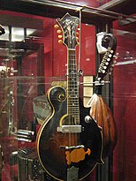 Gibson mandolin modified with Russian electric pickup