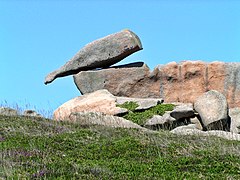 La bouteille renversée.