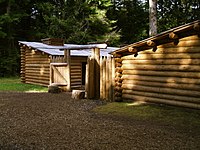 Entrance of log fort with open gate