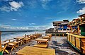 Image 59Cox's Bazar in Bangladesh known for its wide sandy beach, is believed to be the world's longest (120 km) natural sandy sea beach. It is located 152 km south of Chittagong. The photo features a beach restaurant at Cox's Bazar. Photo Credit: Xalan mustafa