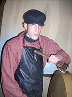 Sicilian arrotino at a living nativity scene wearing traditional Sicilian clothing