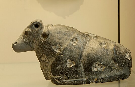 Sumerian bull with rosettes, c.3000 BC, black marble, Louvre