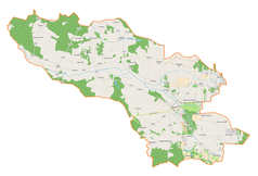 Mapa konturowa gminy Lutomiersk, blisko centrum u góry znajduje się punkt z opisem „Charbice Dolne”