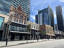 A street with the three buildings on it